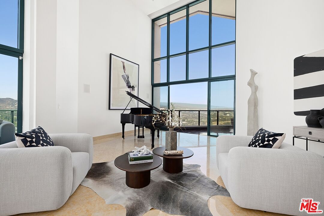 10490 Wilshire Blvd Penthouse 4 with soaring 25-foot ceilings and spiral staircase